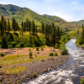 Hells canyon mountain and river photo